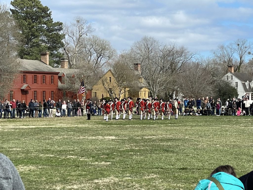 A photo of the drum and fife corps dressed in period costume in Colonial Williamsburg