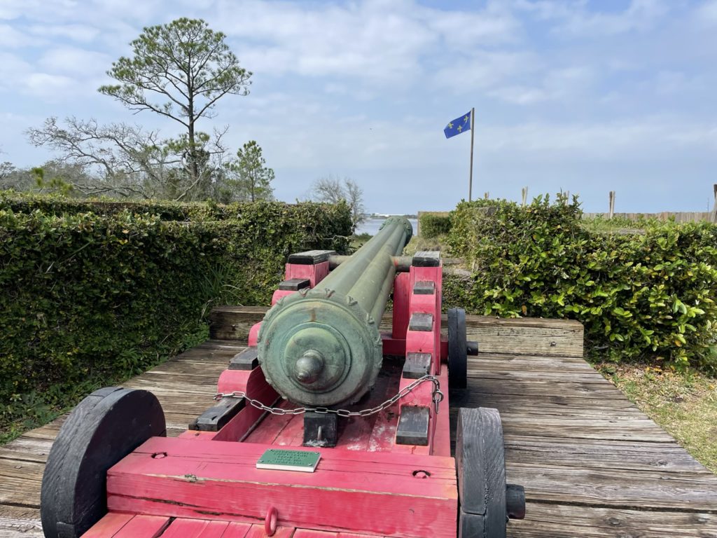 A photo of a cannon pointed toward the river
