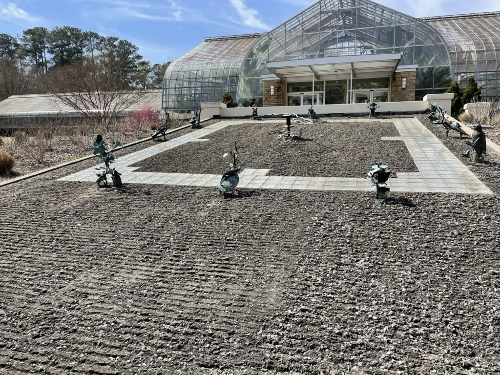 A photo of sculptures outside of the botanical garden